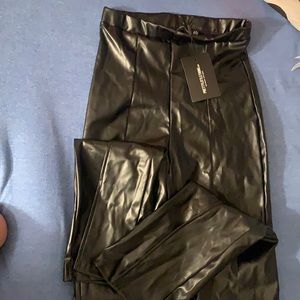 Black faux leather seam split trousers